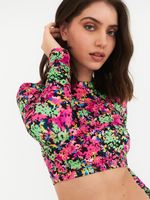 Polera Surf Daikiri Mujer Manga Larga Espalda Abierta Flores Negro Rosa Flúor Filtro UV50+