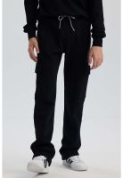 Pantalón Buzo Niño Calce Recto Con Cortes Negro