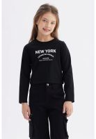 Polera Niña Piping Y Print Negro