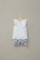 Conjunto calza y polera blanca de niña