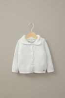 Chaleco crema de niña