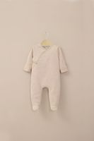 Osito beige con apertura en la espalda de bebé niña