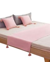 PIECERA CON 2 FUNDAS CON POMPONES ROSA