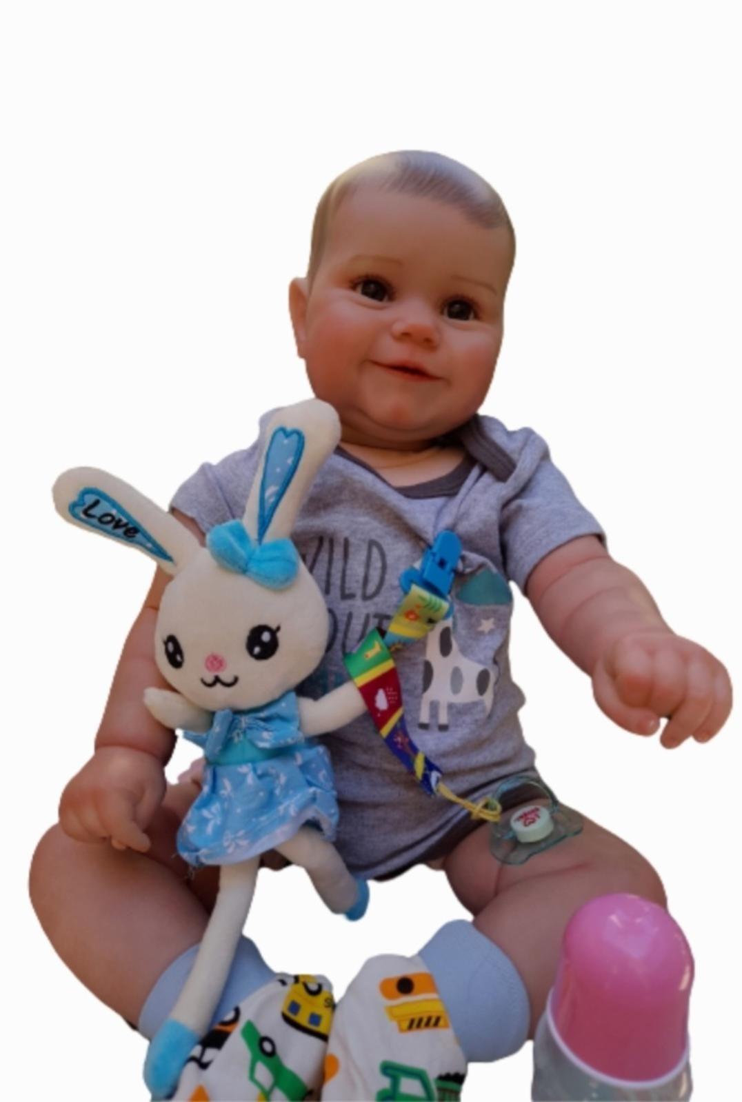Bebe reborn NIÑO 60cm hiper realista con accesorios -0