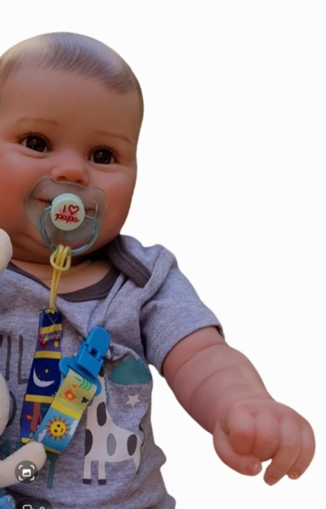 Bebe reborn NIÑO 60cm hiper realista con accesorios -1