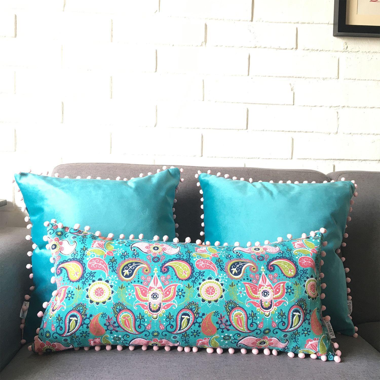 COJIN DECORATIVO DISEÑO PON PON TURQUESA 62X28 RELLENO-2