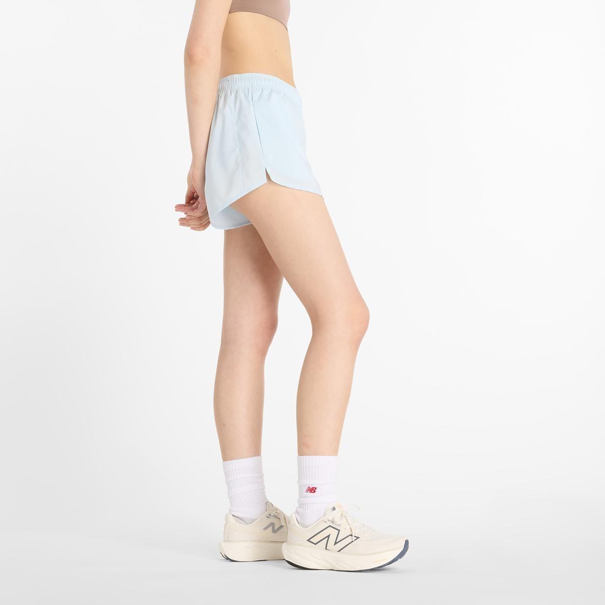 Short Mujer New Balance Sport Essentials Celeste-2