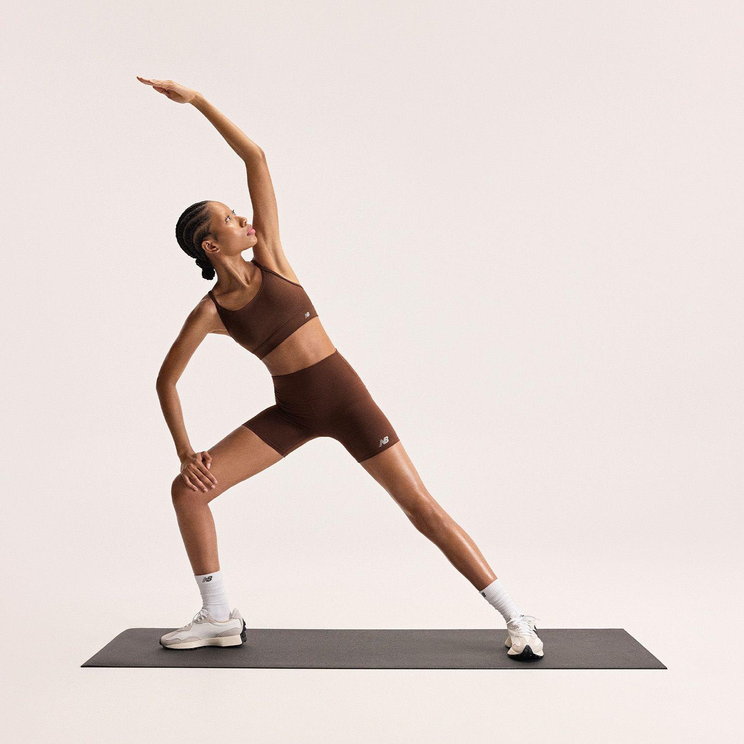 Peto Running Mujer New Balance Essentials Bra Café-1