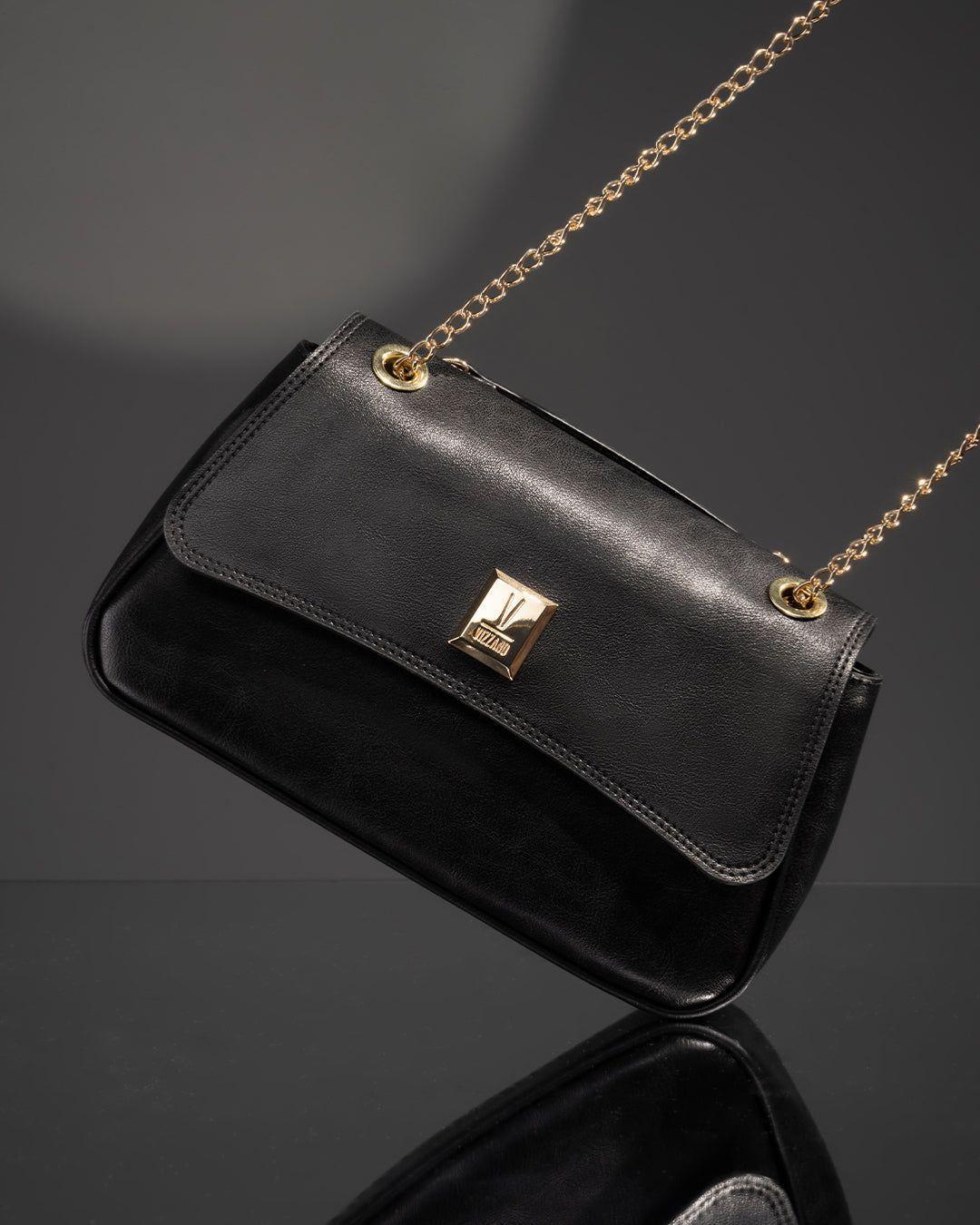 Cartera Vizzano Negra con Cadena Dorada y Logo Metálico-6