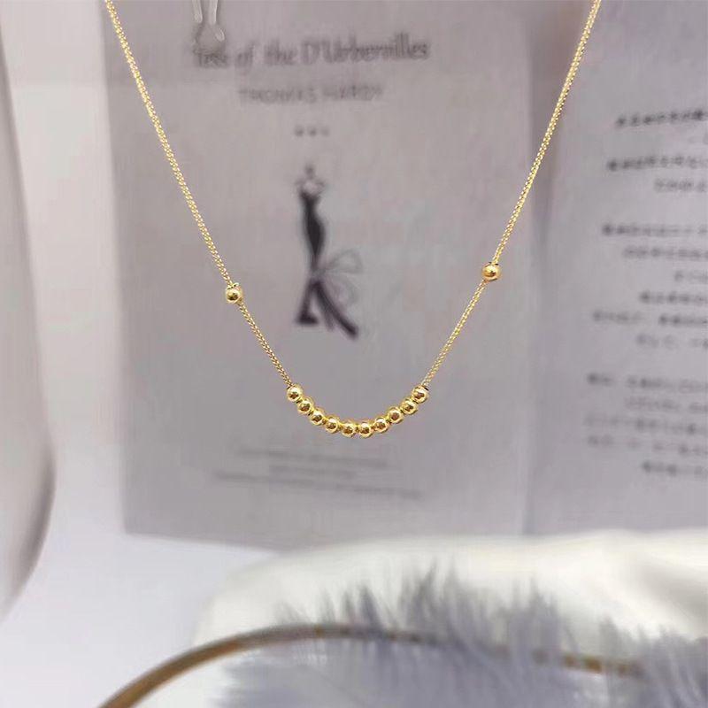 CADENA TEJIDA ORO AMARILLO 18K COLGANTE 12 PELOTITAS 18K-2