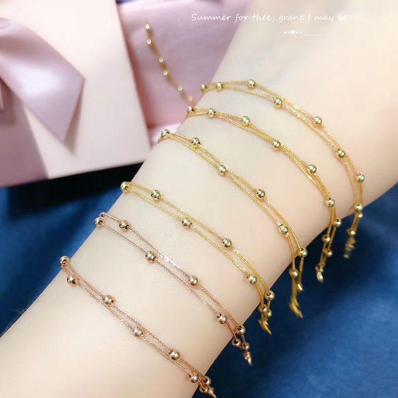 PULSERA DOBLE PELOTITAS ORO AMARILLO 18K-3