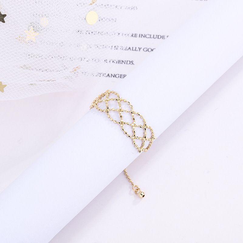 ANILLO ORO AMARILLO 18K PELOTITAS DISEÑO AJUSTABLE-2