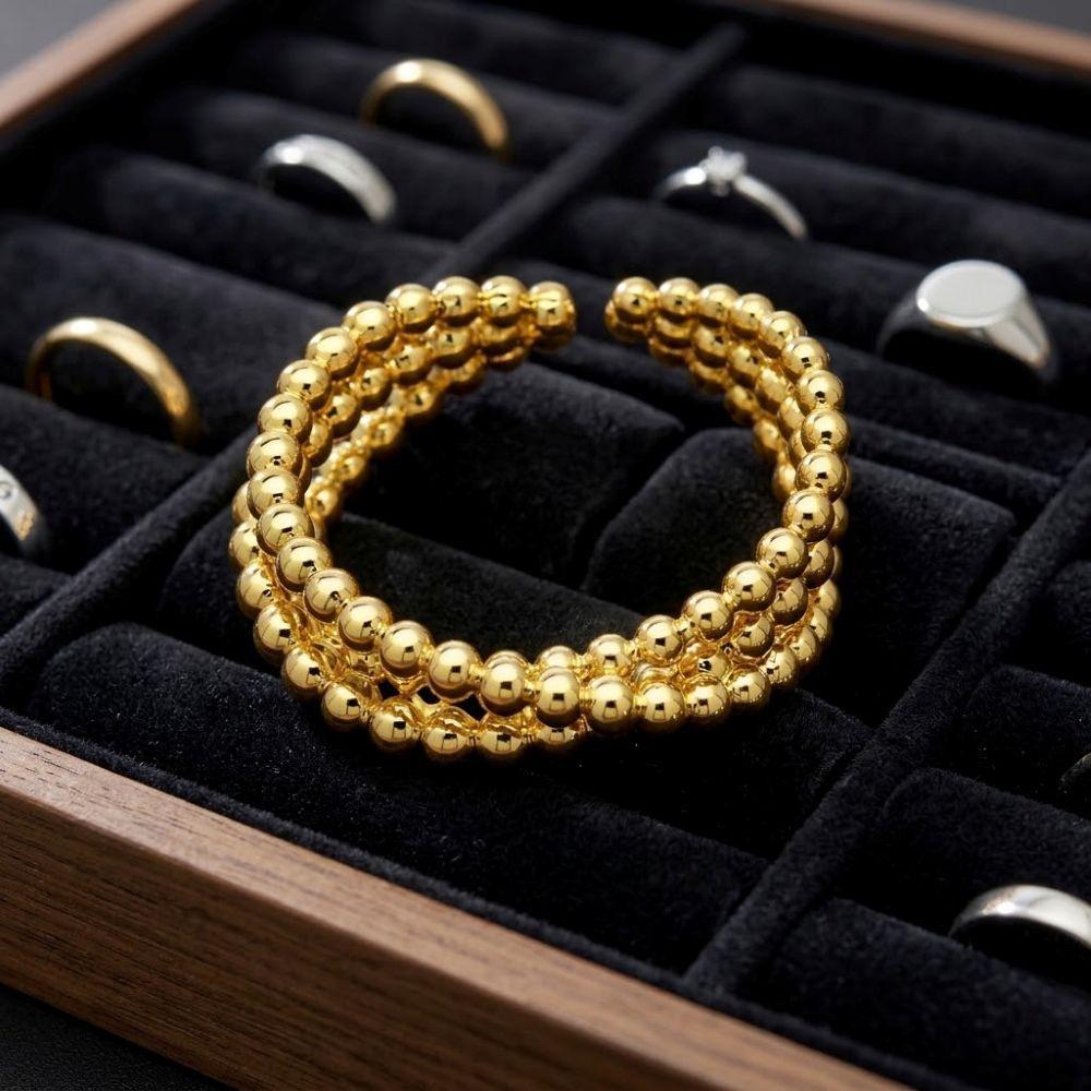ANILLO ENCHAPADO ORO PELOTITAS CRU-1