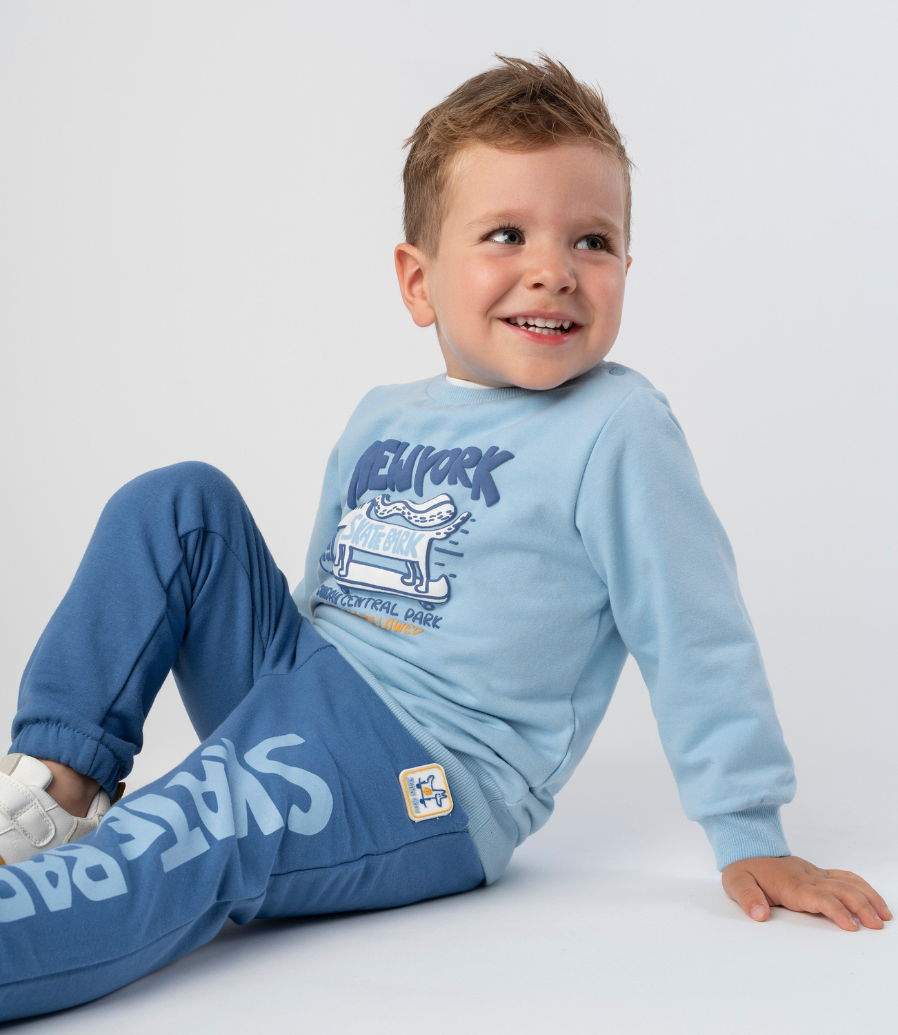 Buzo bebé skate celeste 4 Kids-1