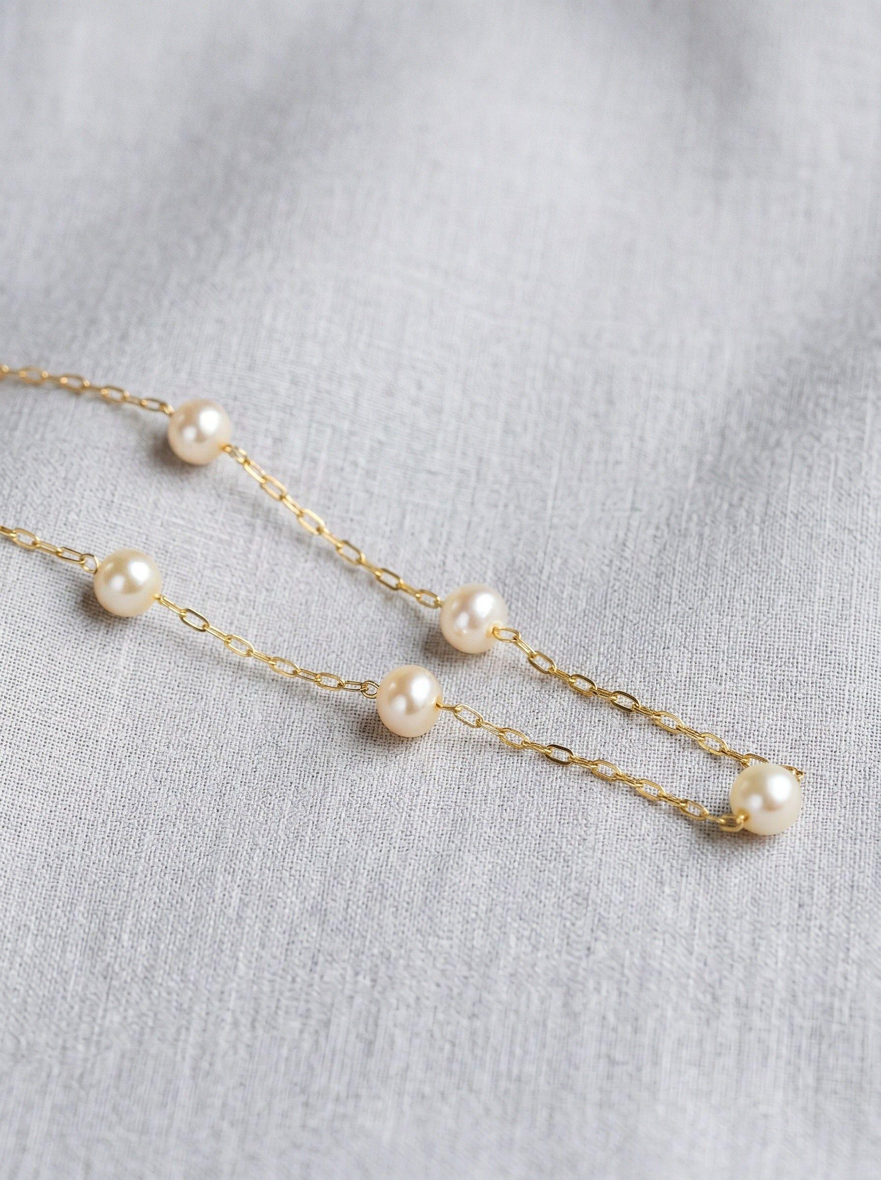 COLLAR DE ORO 18 K CON PERLAS CULTIVADAS DE 5 MM CADA UNA-2