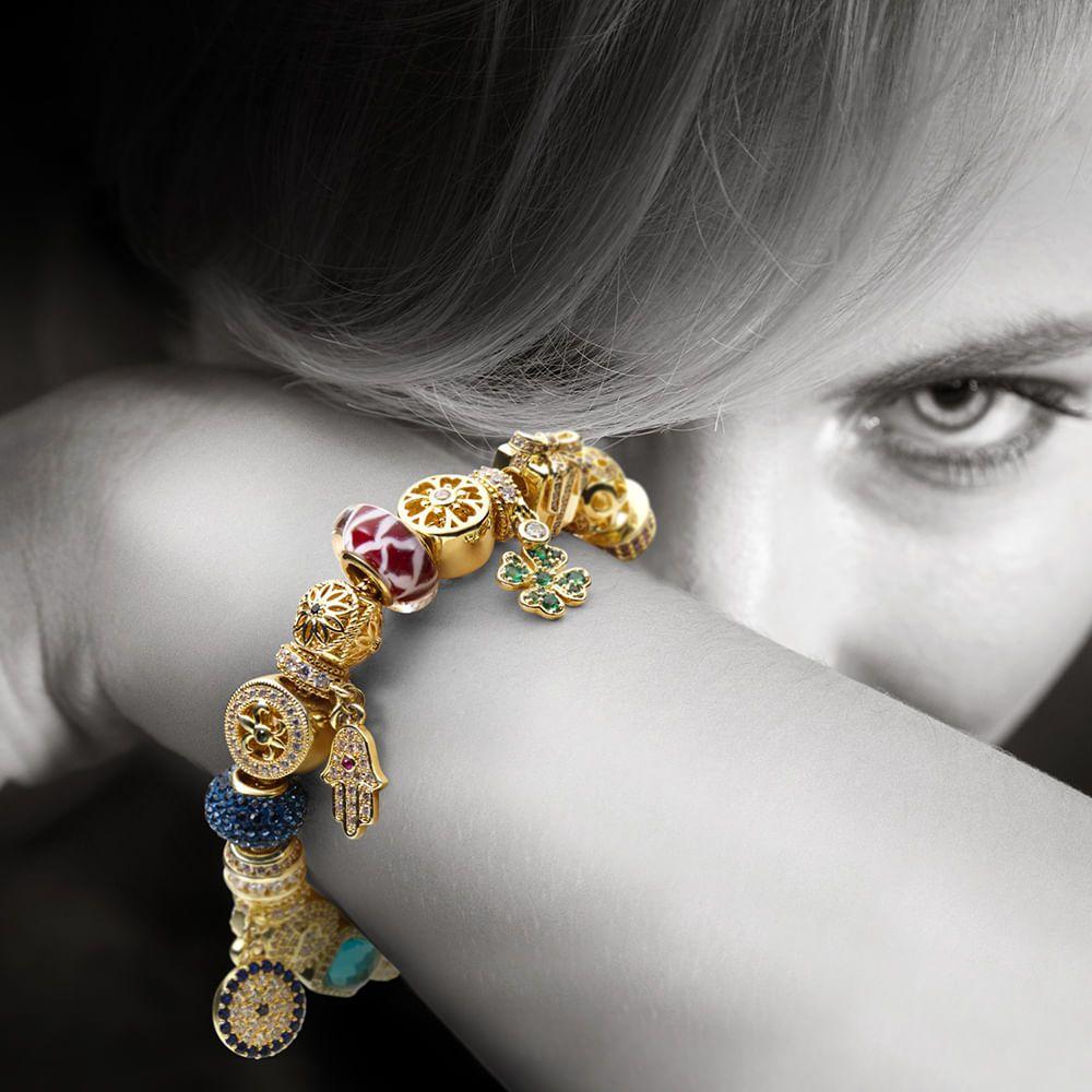 Pulsera con 18 accesorios de oro-4
