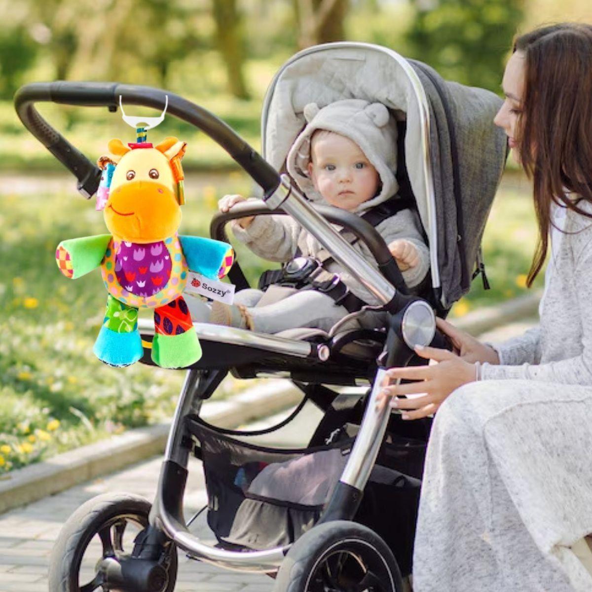 SONAJERO PELUCHE COLGANTE MUSICAL SENSORIAL BEBE LAU-5