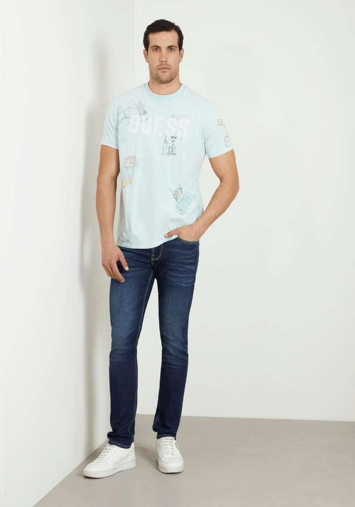 Polera Guess Hombre Ss Bsc World Stamps Tee Celeste-1