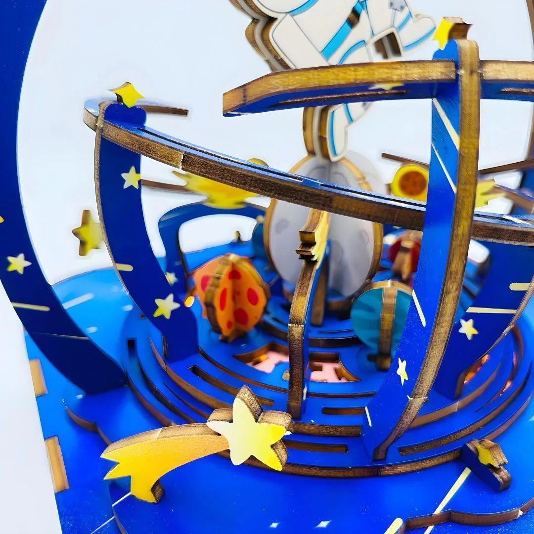 Paseando por el espacio - Caja de música Armable-2