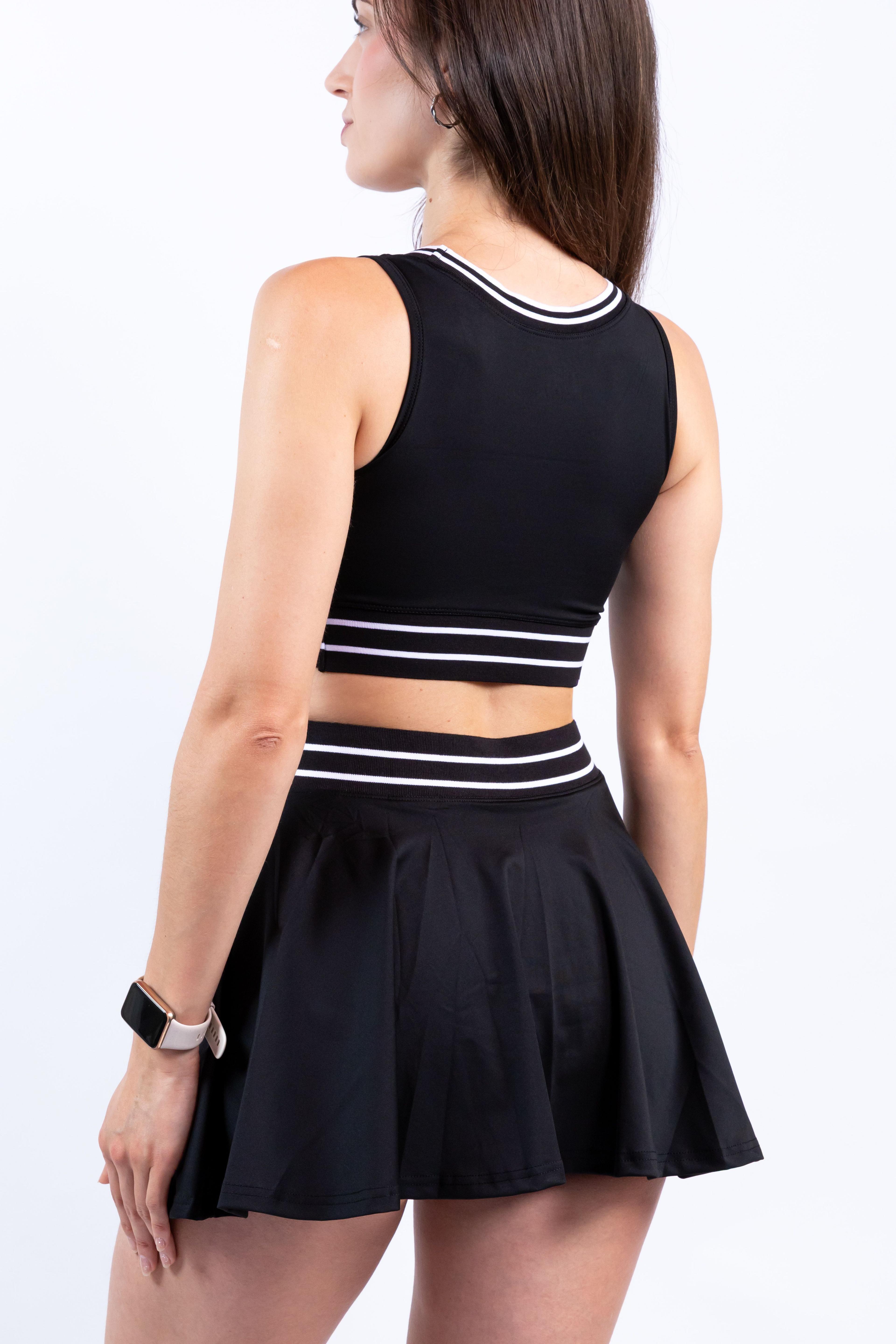 Conjunto deportivo Revel Sport- Falda short y top con líneas modernas-2