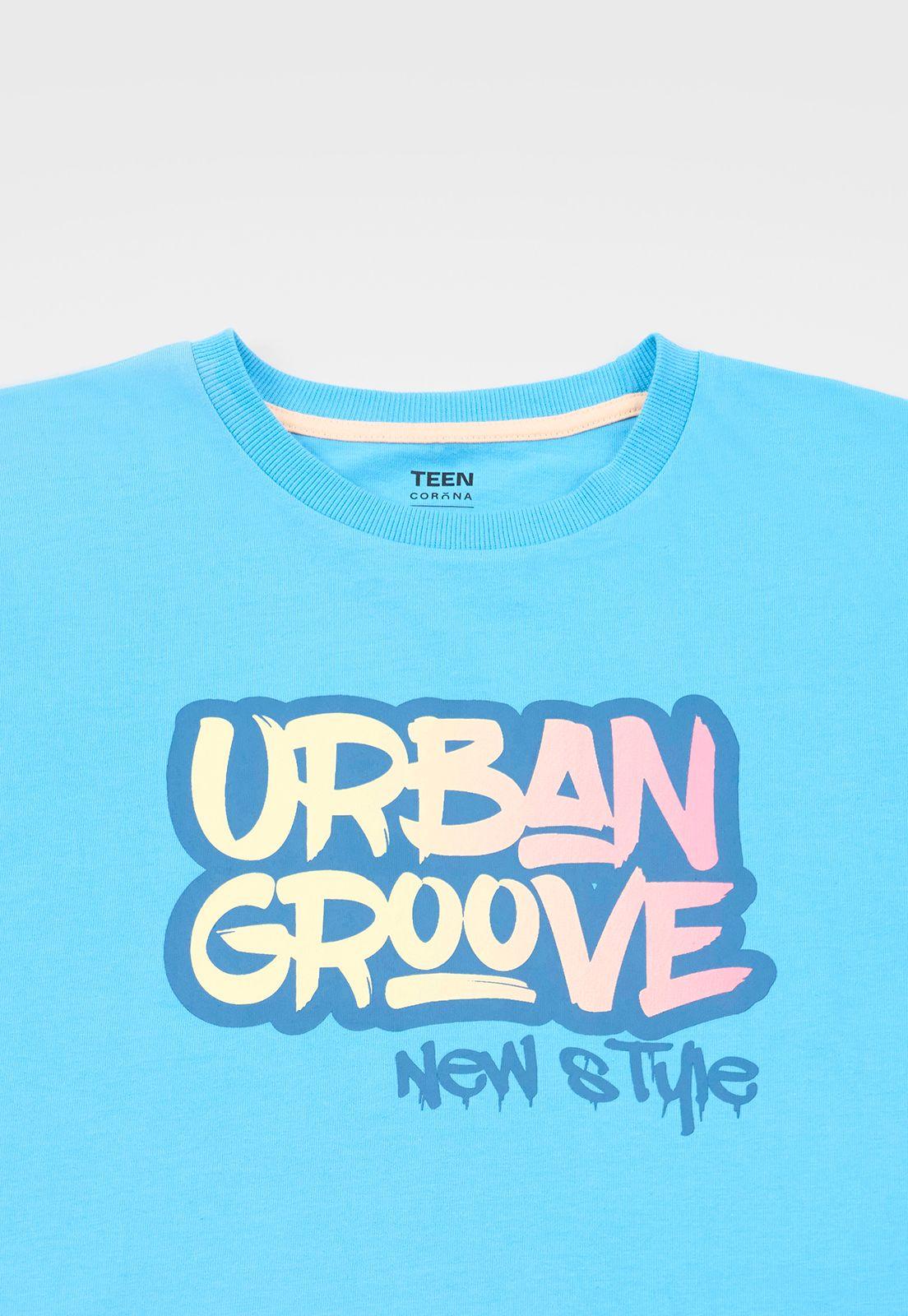 Polera Niño Teen M/C Back Print Celeste Corona-2