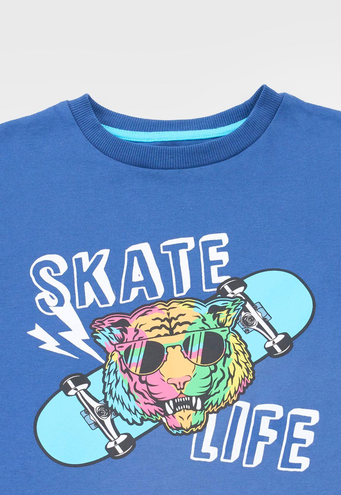 Polera Niño Kids M/C Print Fluor Azul Corona-2