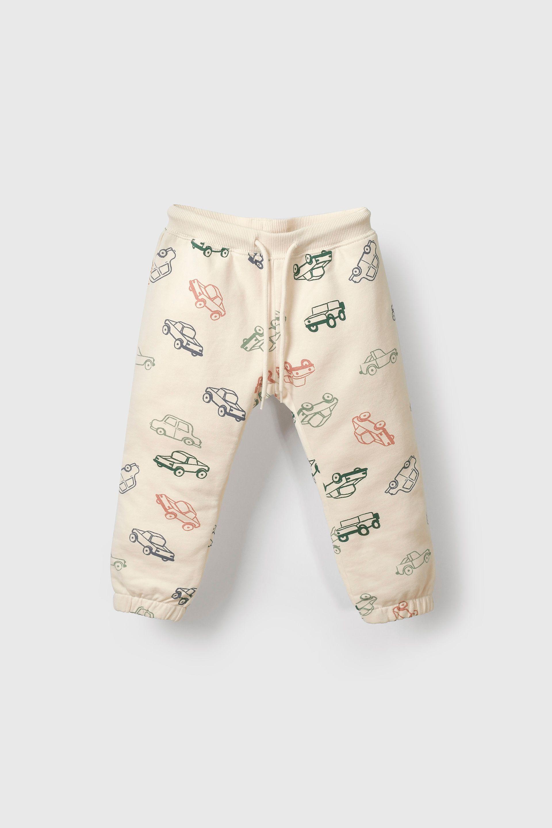 Buzo blanco con estampado de autos para niños-0