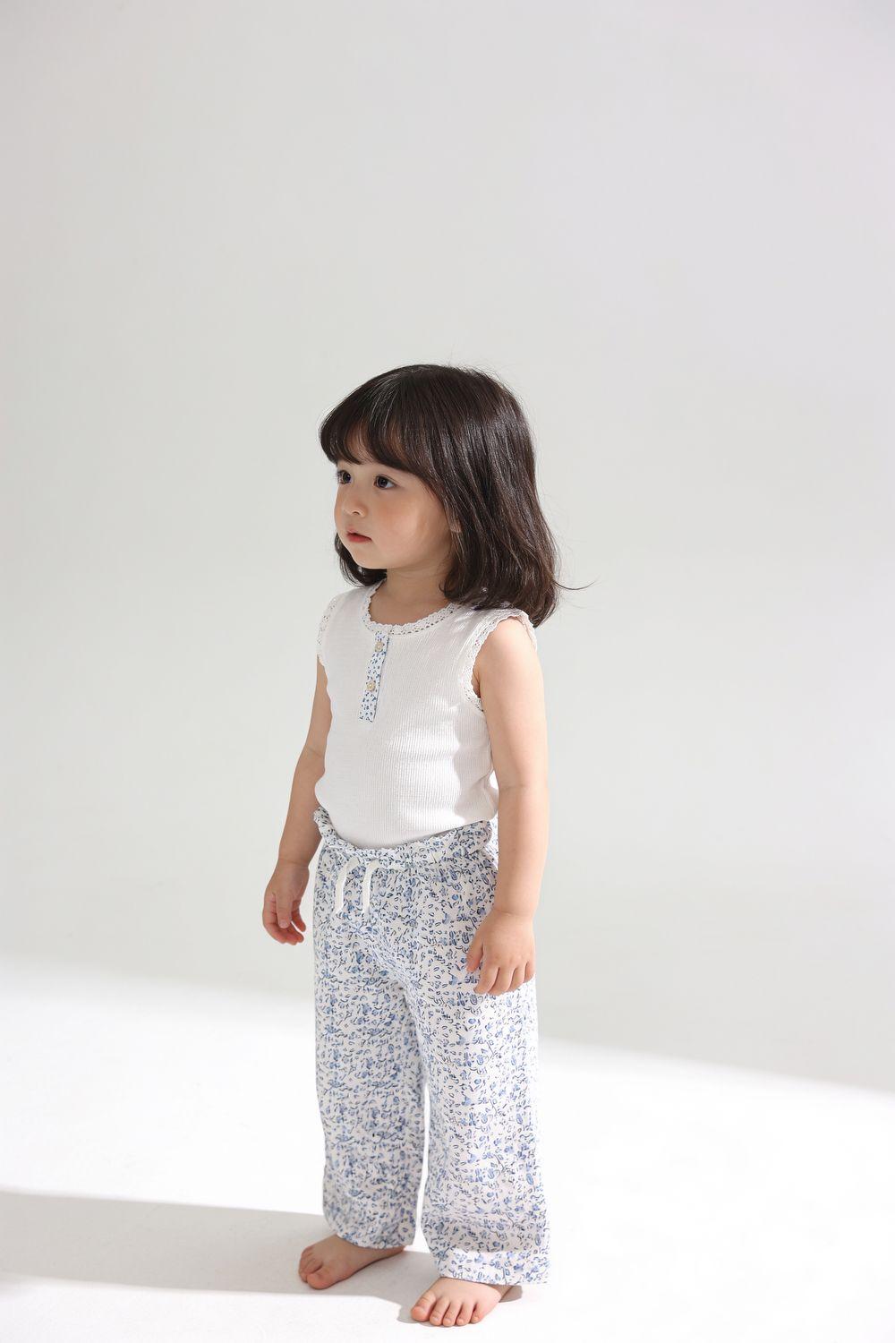 Pantalon tejido waffle niña celeste 6-9M a 4-5A-1