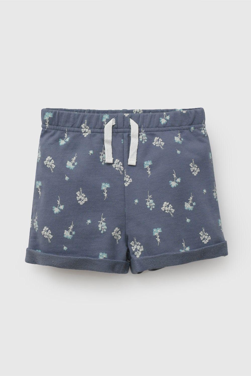 Conjunto Polera y Short Flores Celeste de Niña COJE3210V26-2