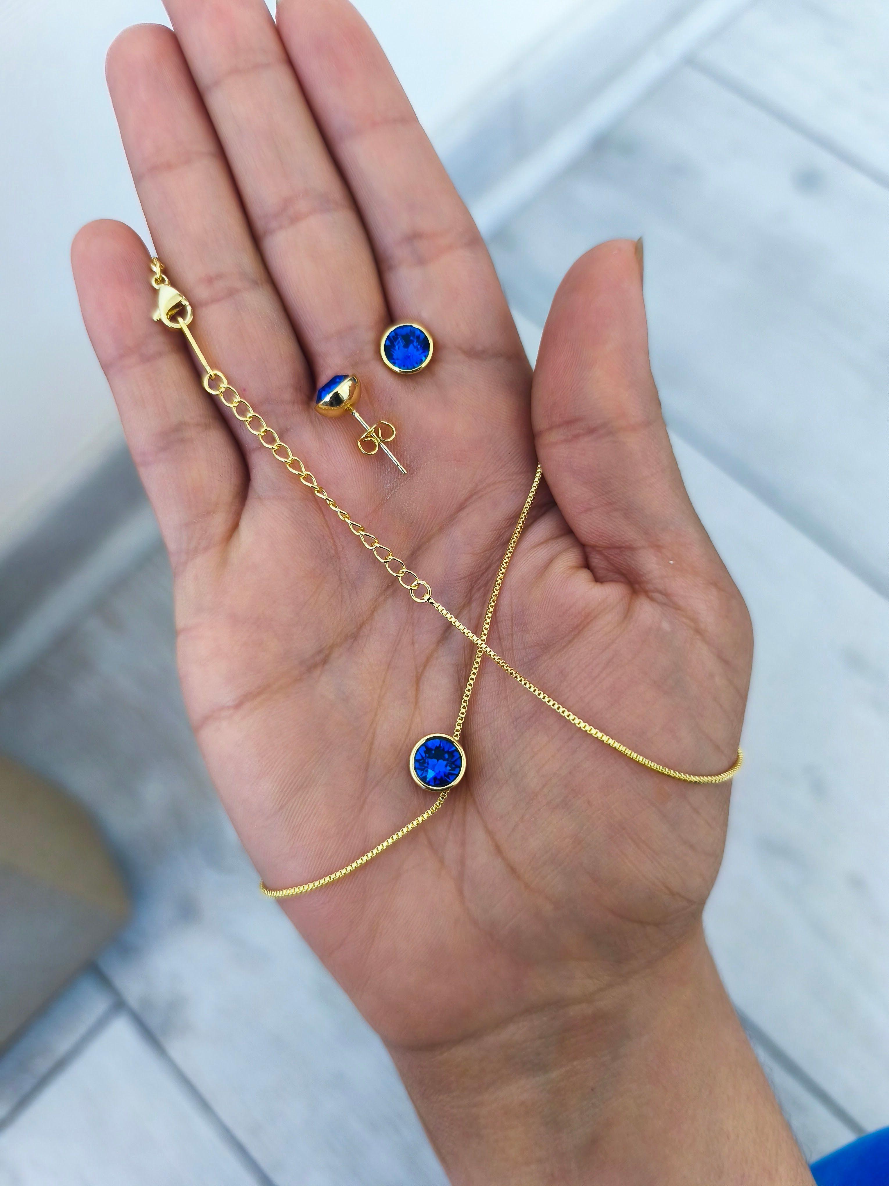 Conjunto collar mas aros punto de luz azul Baño Oro mas caja de regalo-2