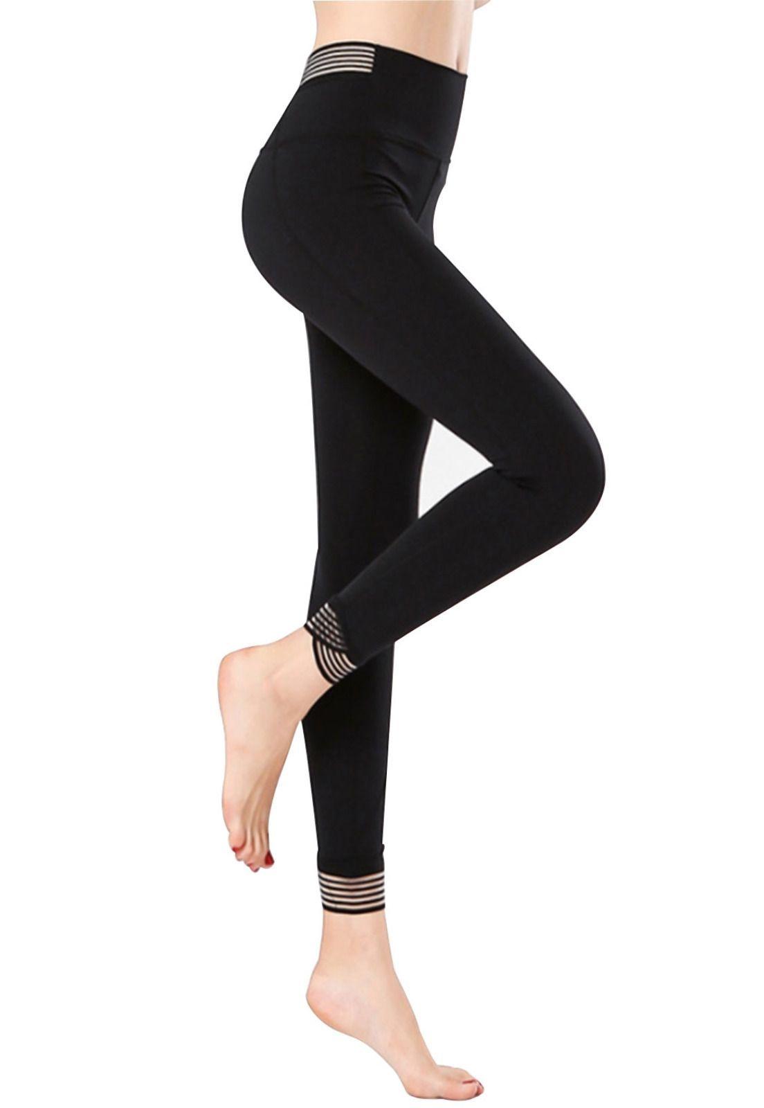 Calza deportiva aplicación en puño negra-1