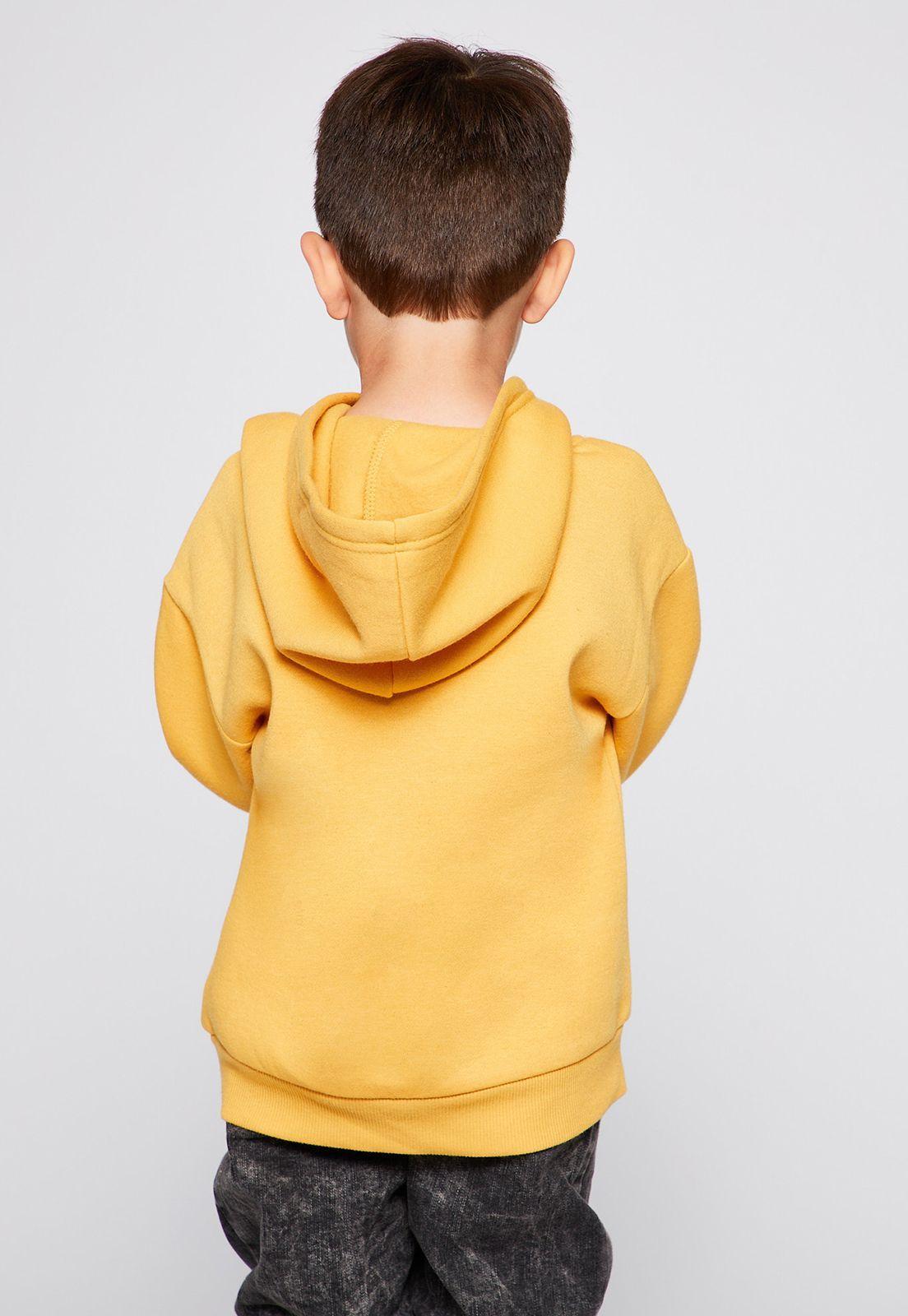 Poleron Canguro Estampado Mostaza  Family Shop-1