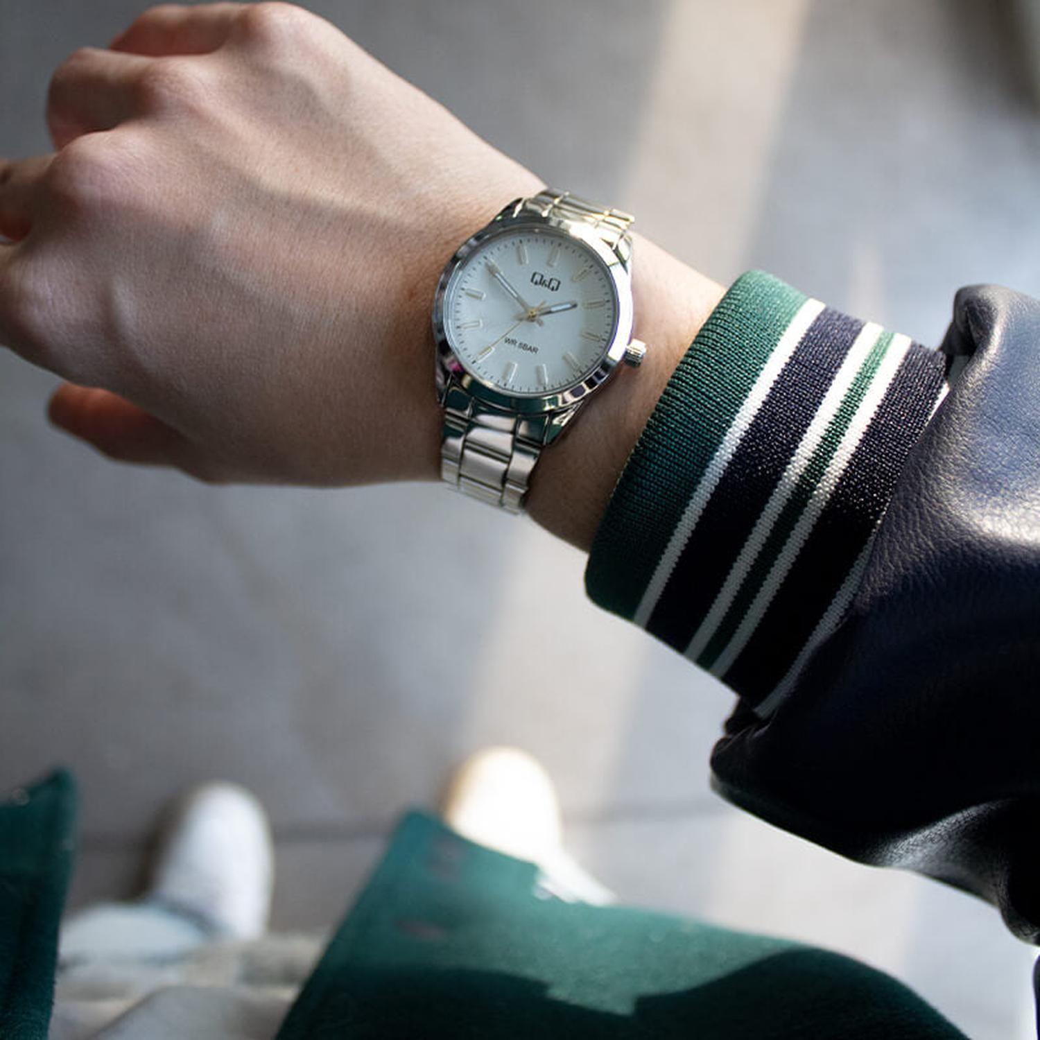 Reloj Q&Q Análogo Unisex Q82A-001P-1