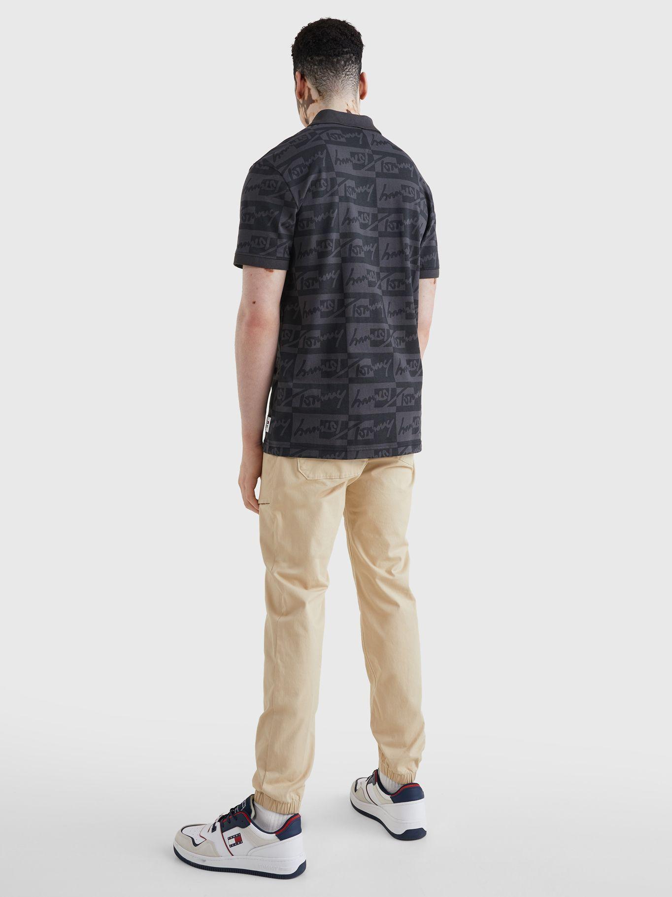 Polo Relaxed Signature Logo Negro Tommy Jeans JN2-1