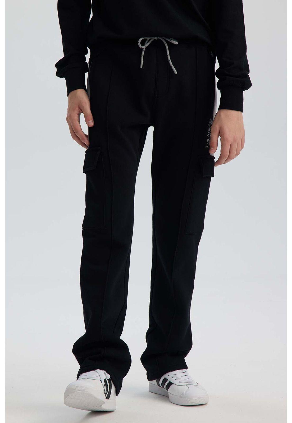 Pantalón Buzo Niño Calce Recto Con Cortes Negro-0
