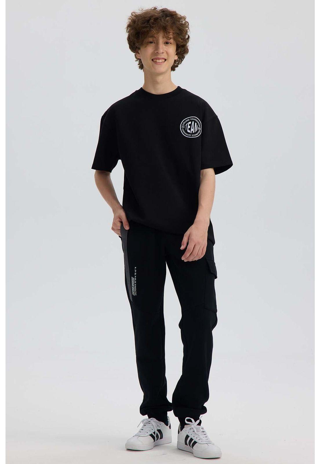 Pantalón Buzo Niño Calce Recto Con Cortes Negro-3