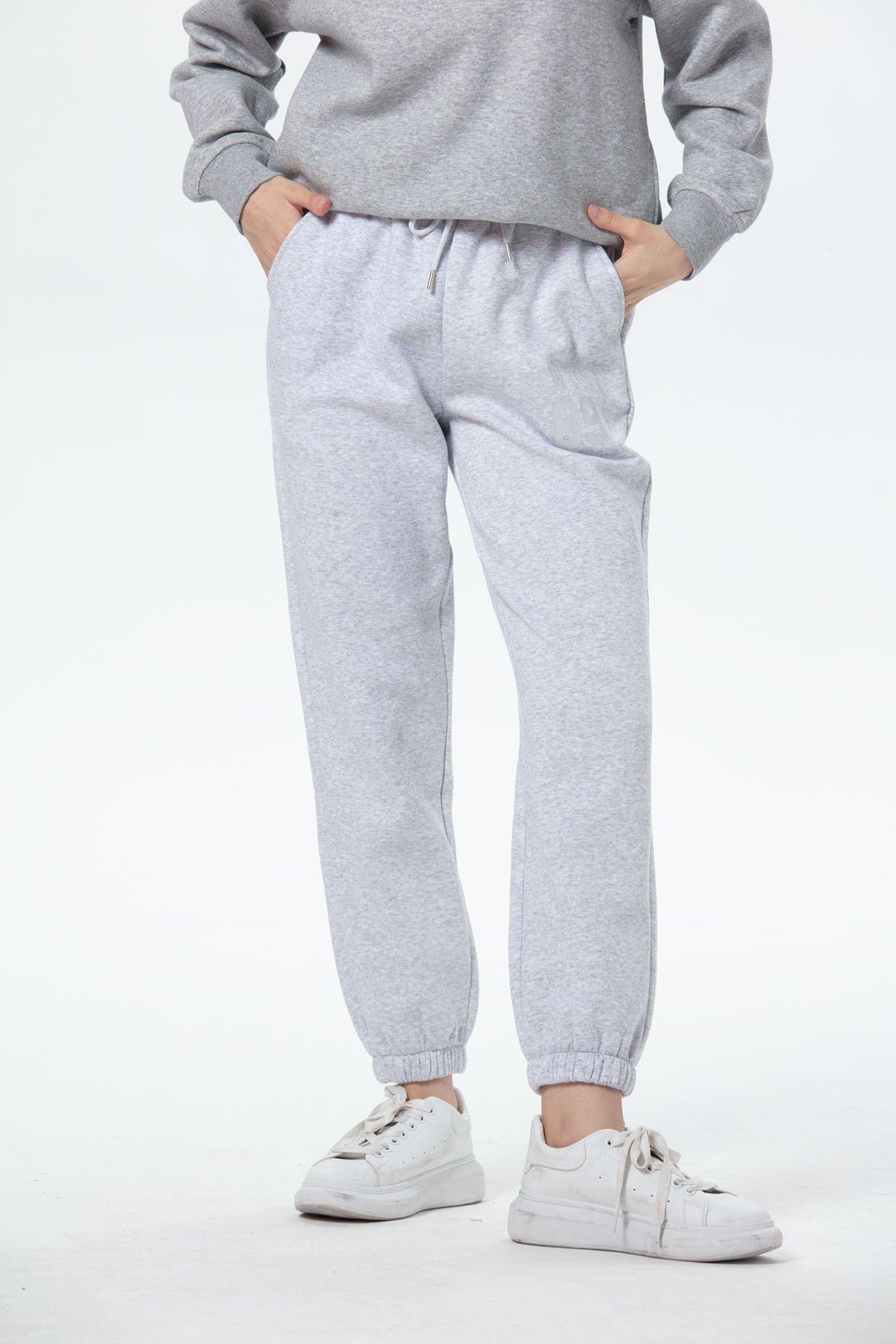 Pantalón Buzo Mujer Jogger Gris Melange-0