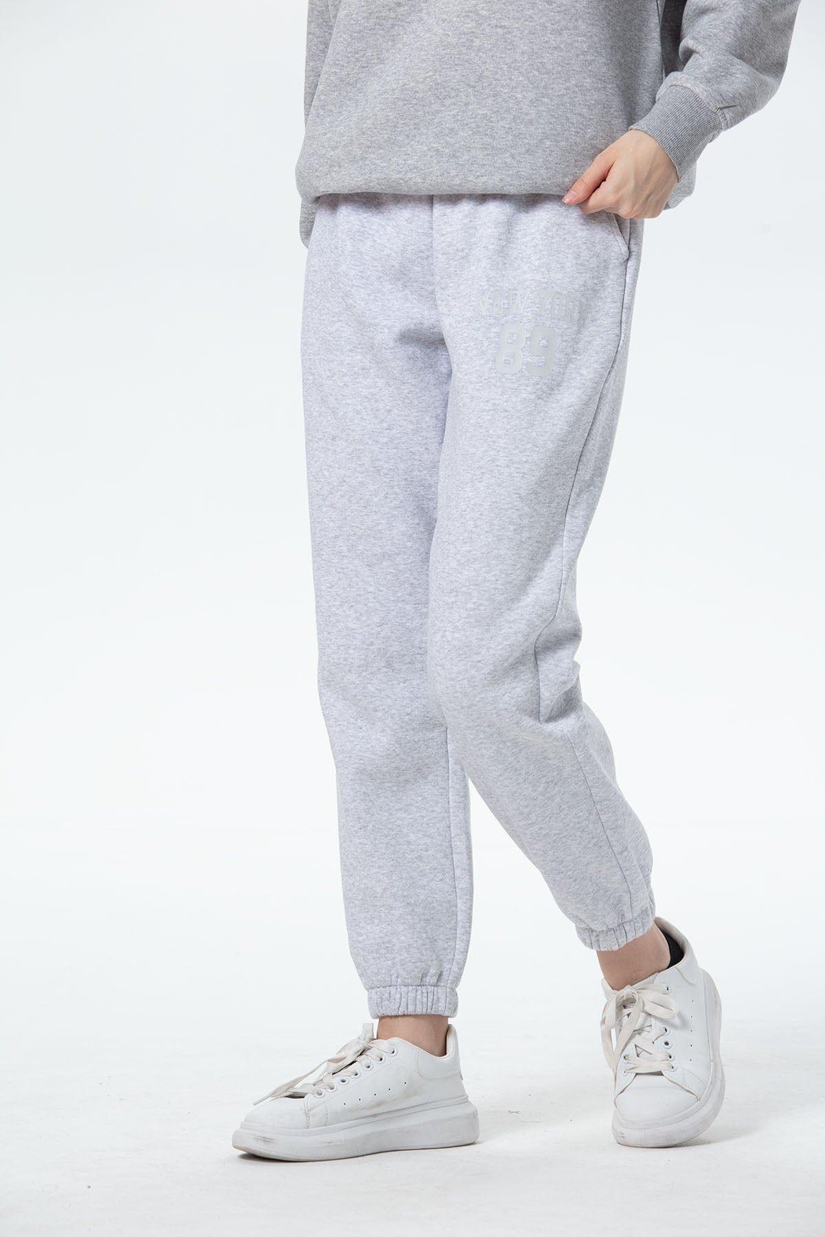 Pantalón Buzo Mujer Jogger Gris Melange-1