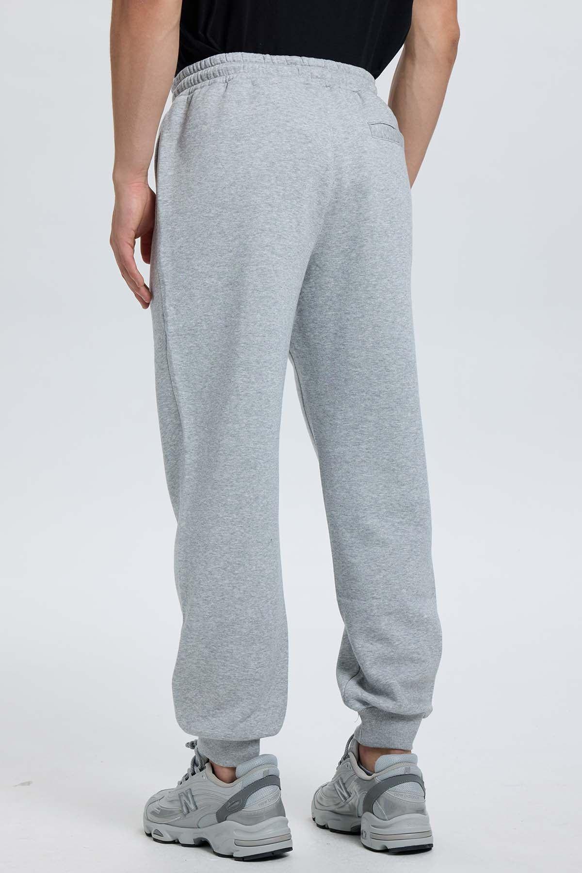 Pantalón Buzo Hombre Jogger Gris Melange-2