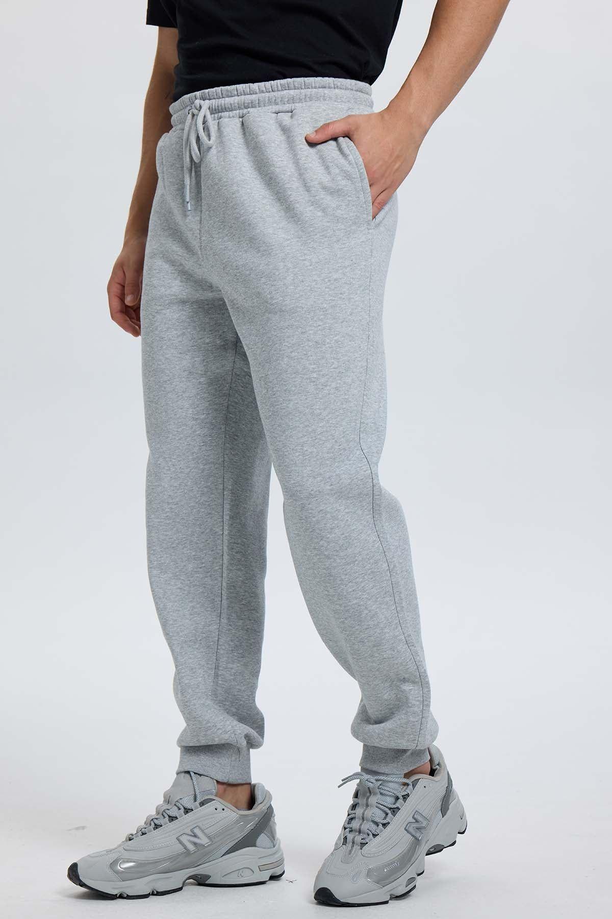 Pantalón Buzo Hombre Jogger Gris Melange-1