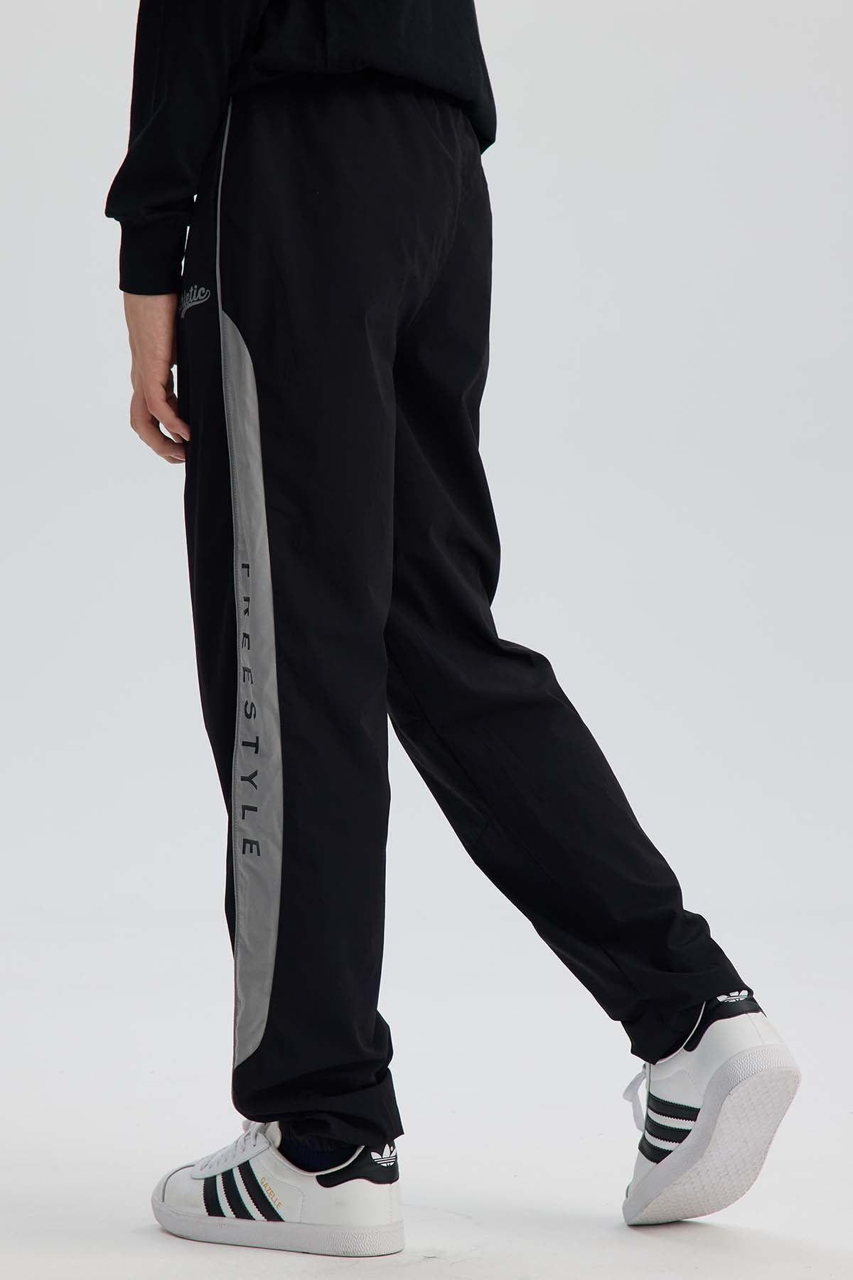 Pantalón Niño Jogger Con Cortes Negro-2