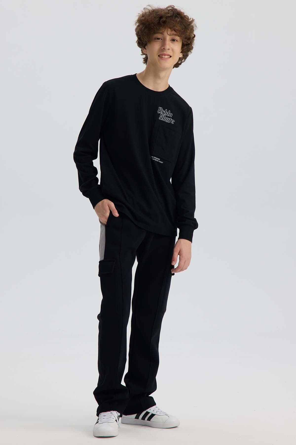 Pantalón Niño Jogger Con Cortes Negro-3