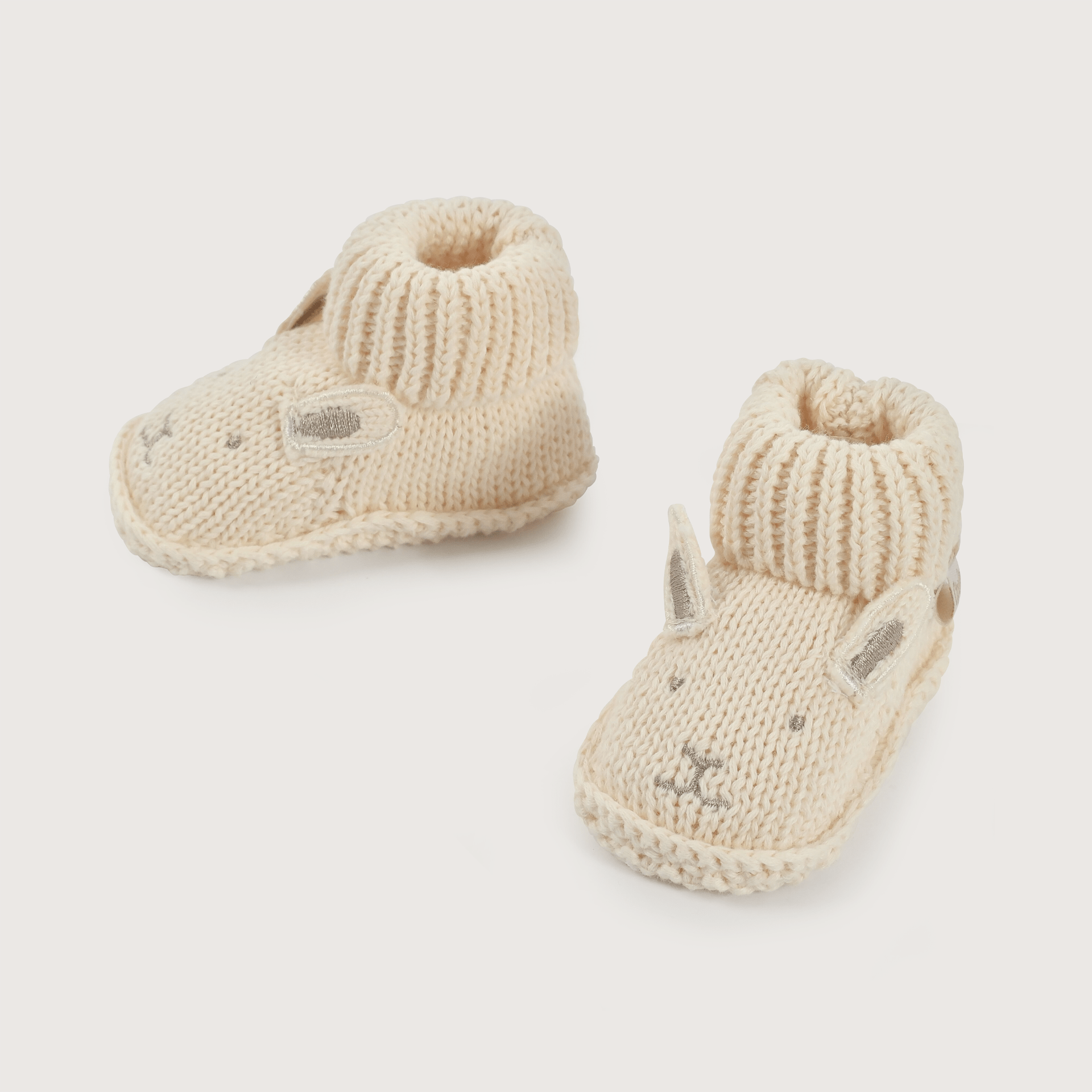 Pantufla bebé tejida beige de niña-3