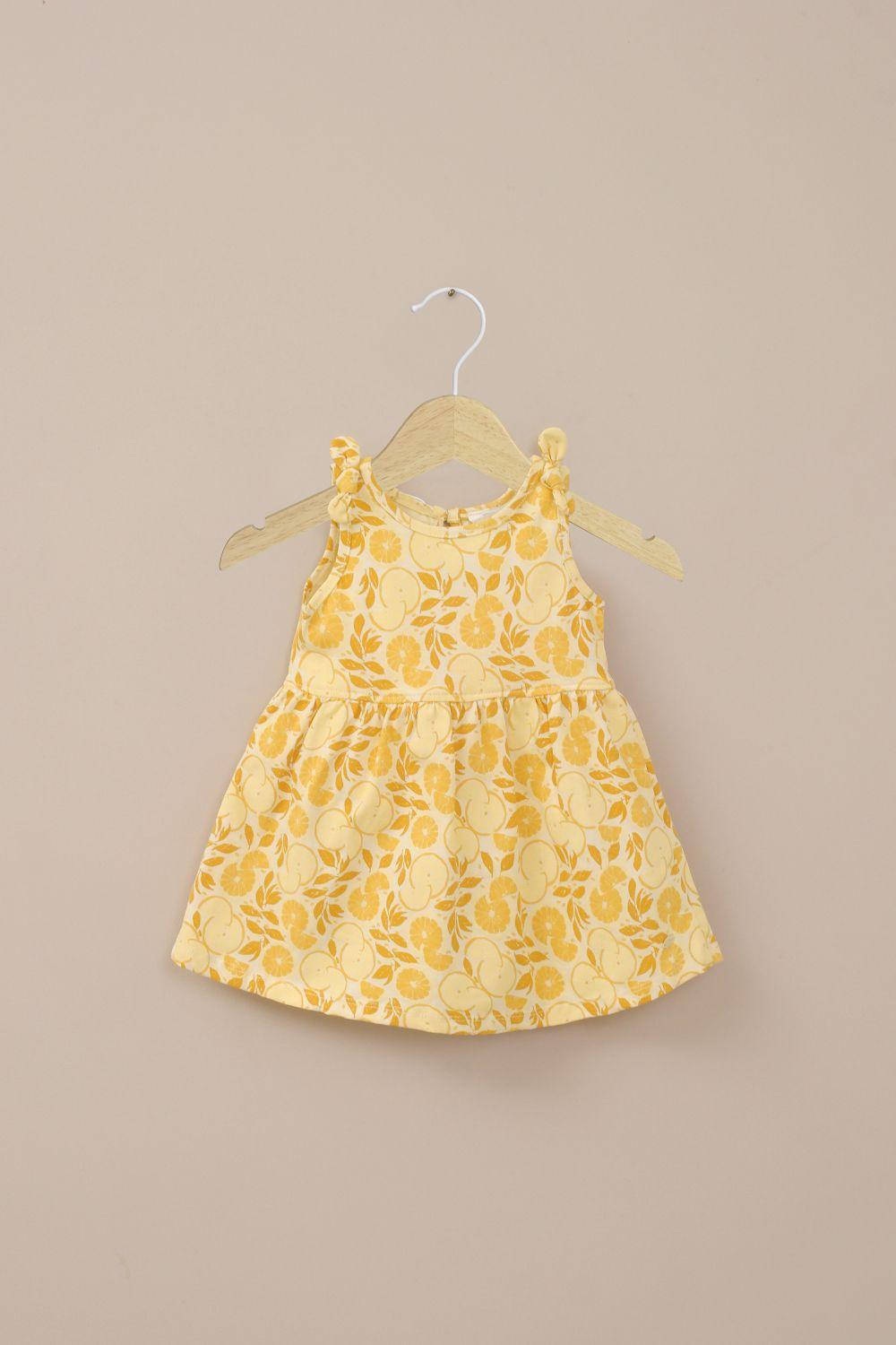 Vestido amarillo estampado de niña-0