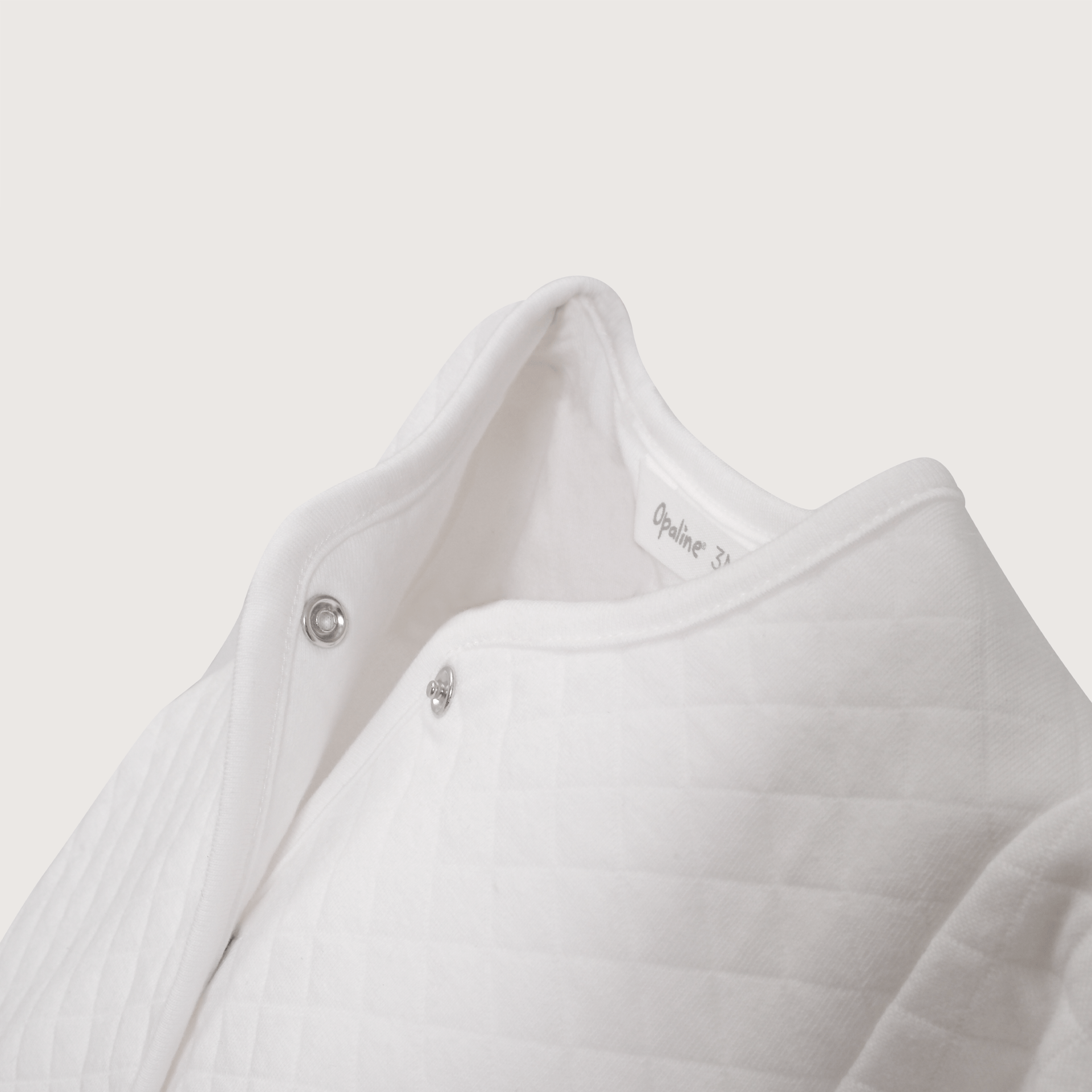 Chaqueta quilted blanca de bebé unisex-3