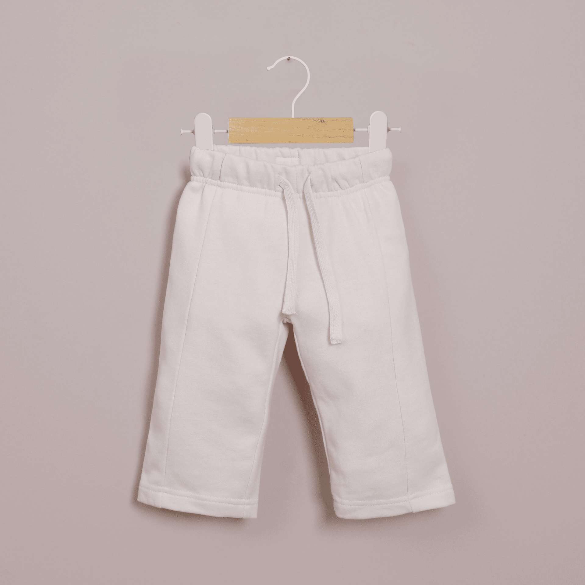 Pantalón de buzo crema de niña-0