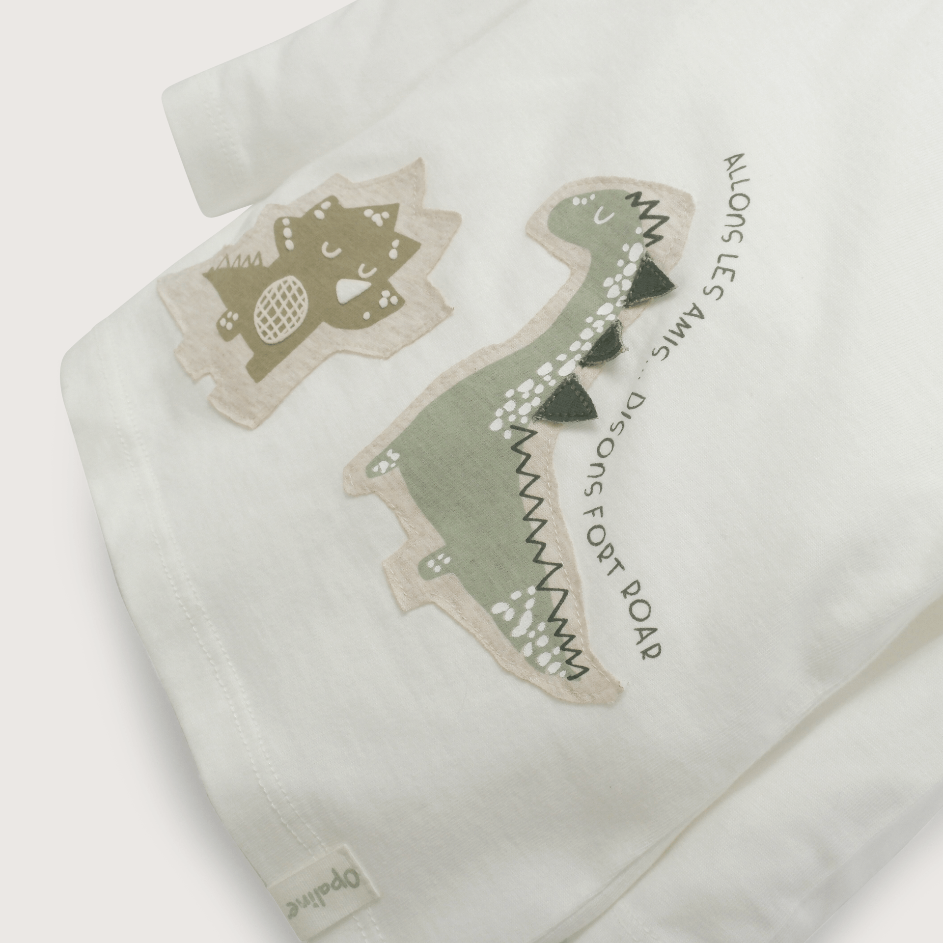 Polera manga larga blanca dinosaurios de niño-3