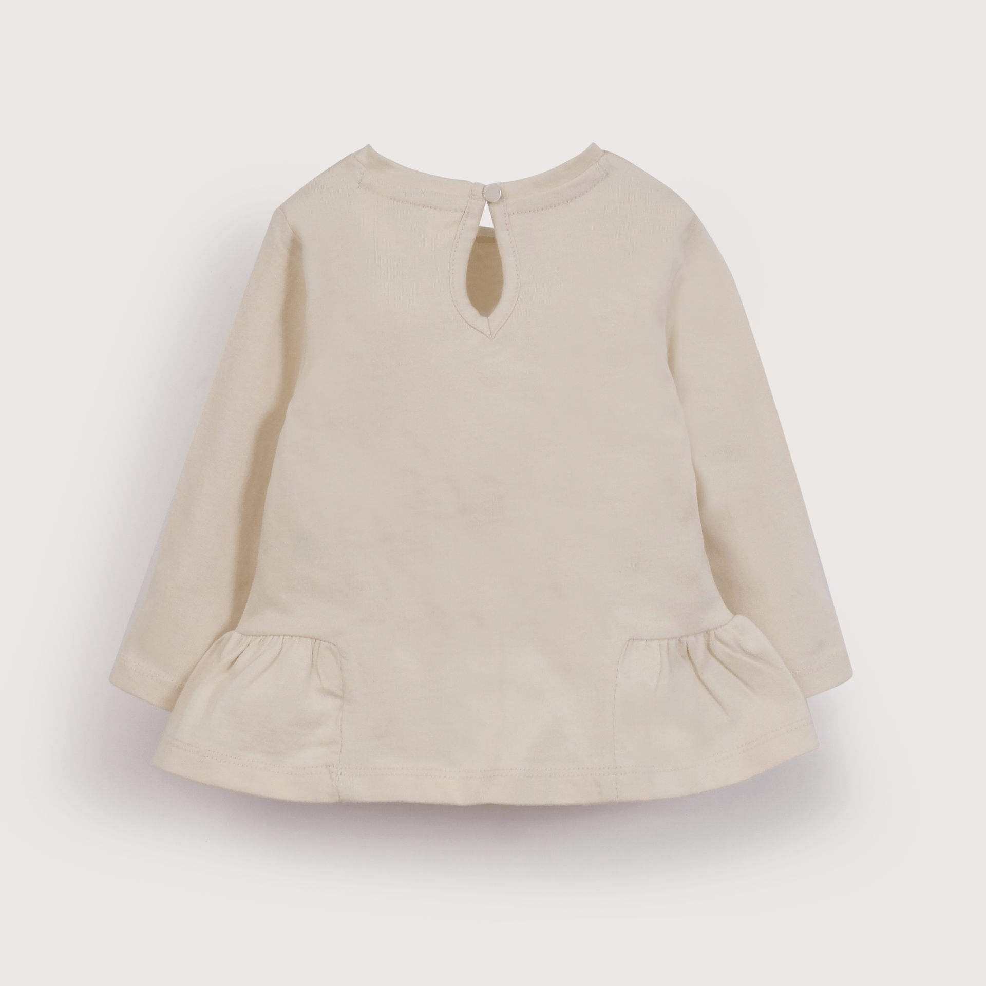 Polera manga larga crema de niña-2