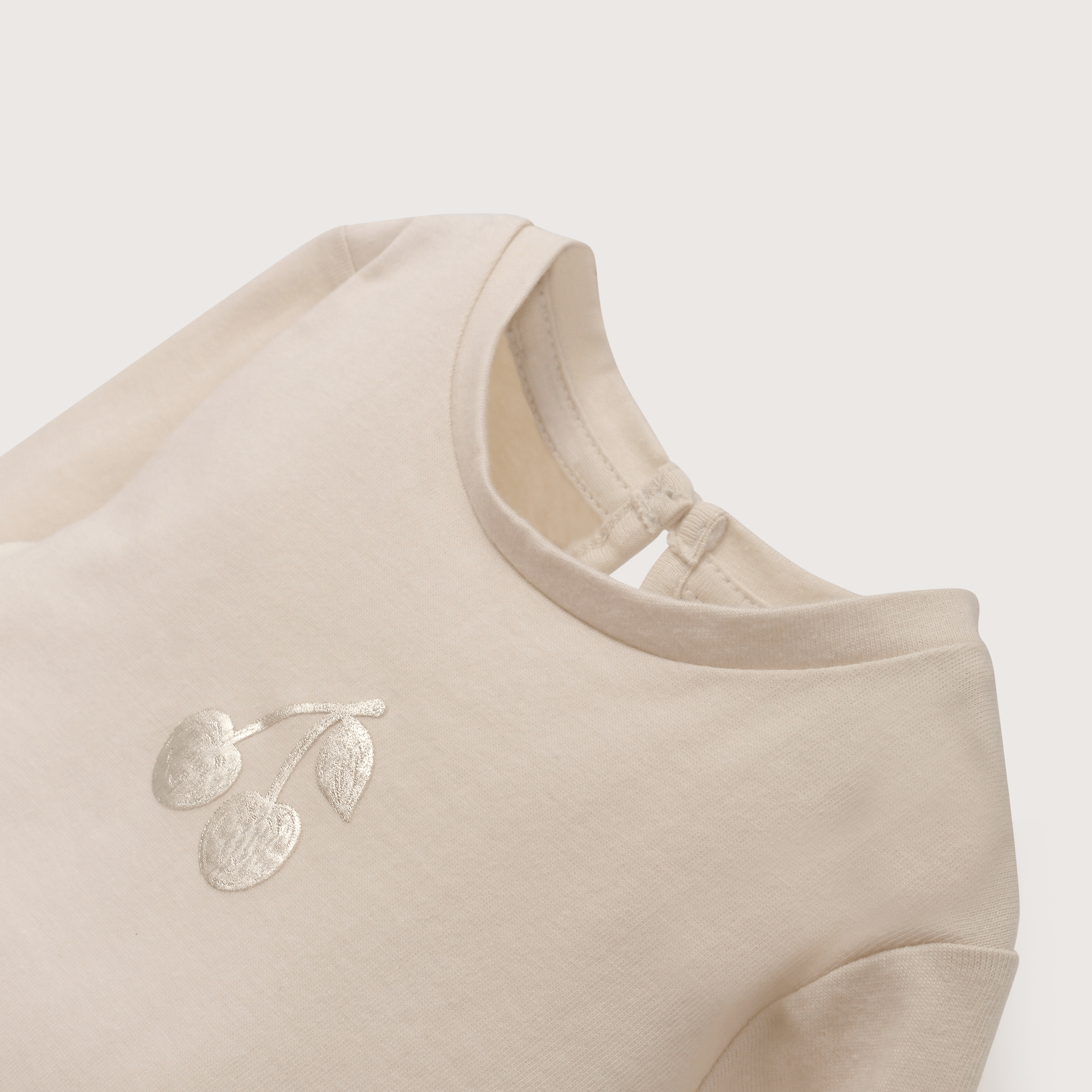 Polera manga larga crema de niña-3