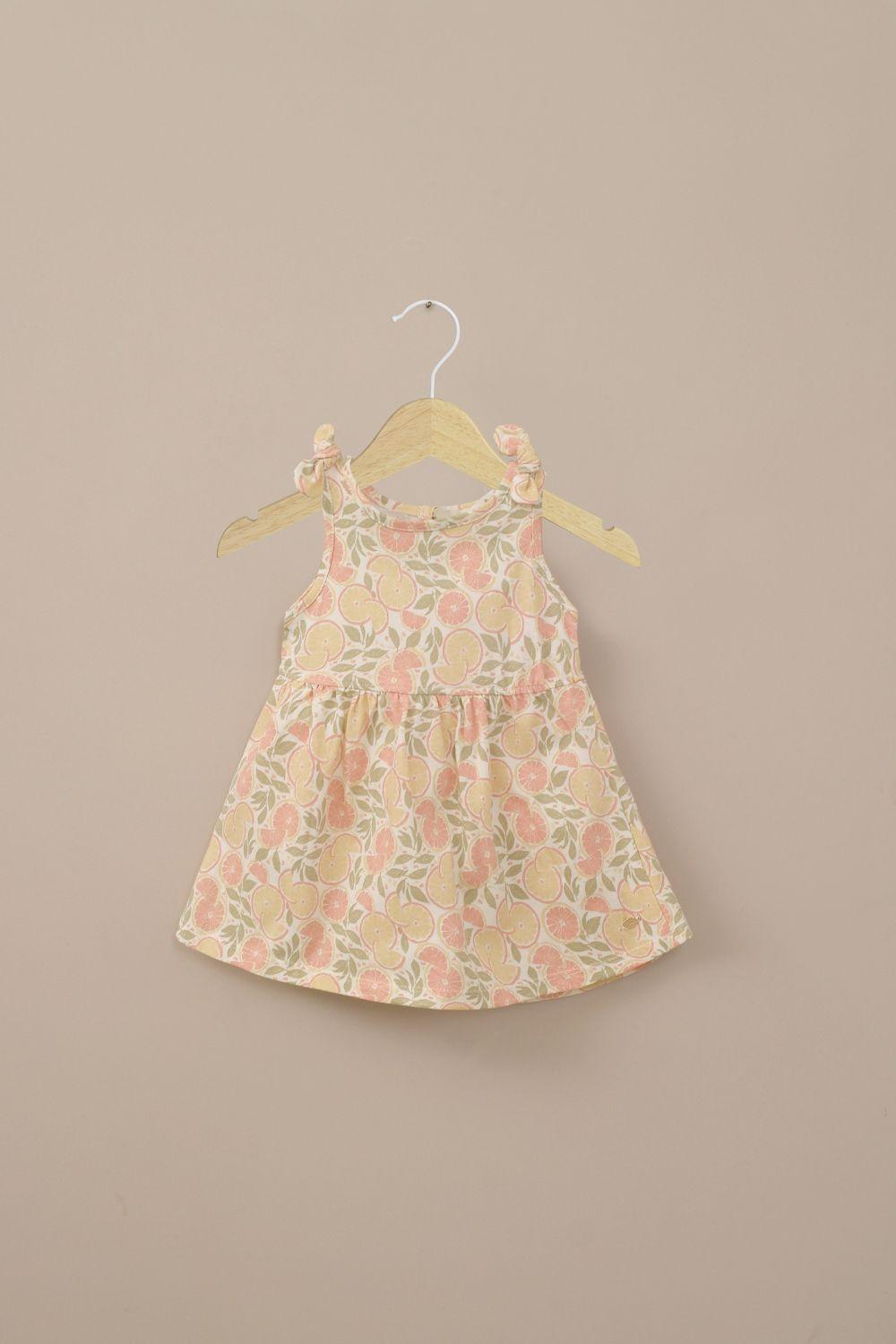 Vestido beige estampado de niña-0